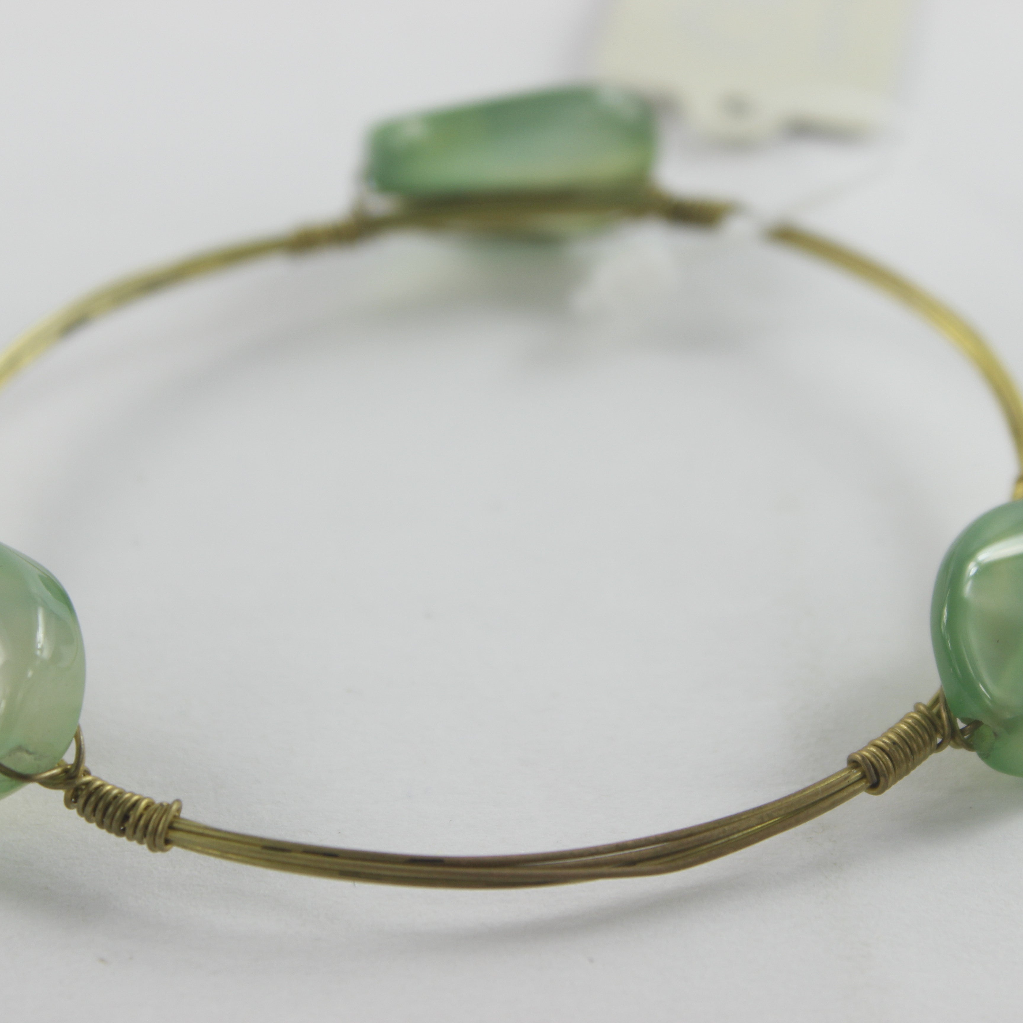 Pulsera de cordón metálico con dijes B1489