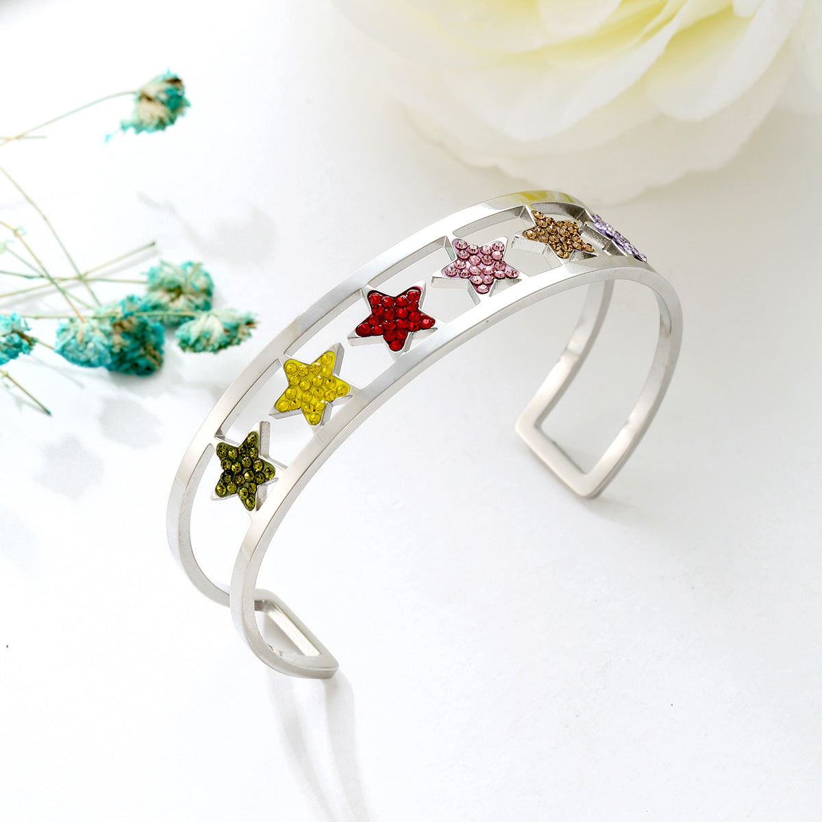 Brazalete de acero inoxidable con diamantes de imitación y estrellas B2675