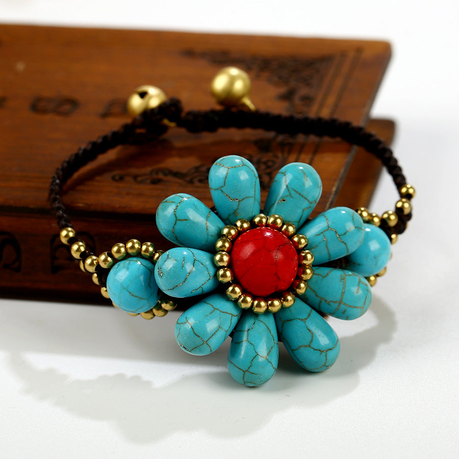 Pulsera trenzada con flores turquesas B4023