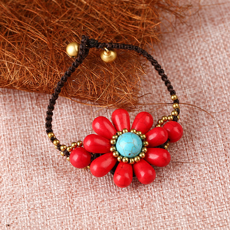 Pulsera trenzada con flores turquesas B4023