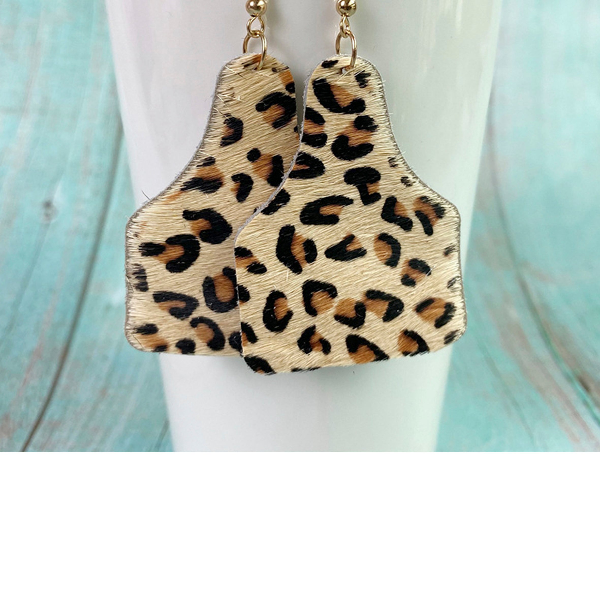 Pendientes de piel de vaca con estampado animal E6545
