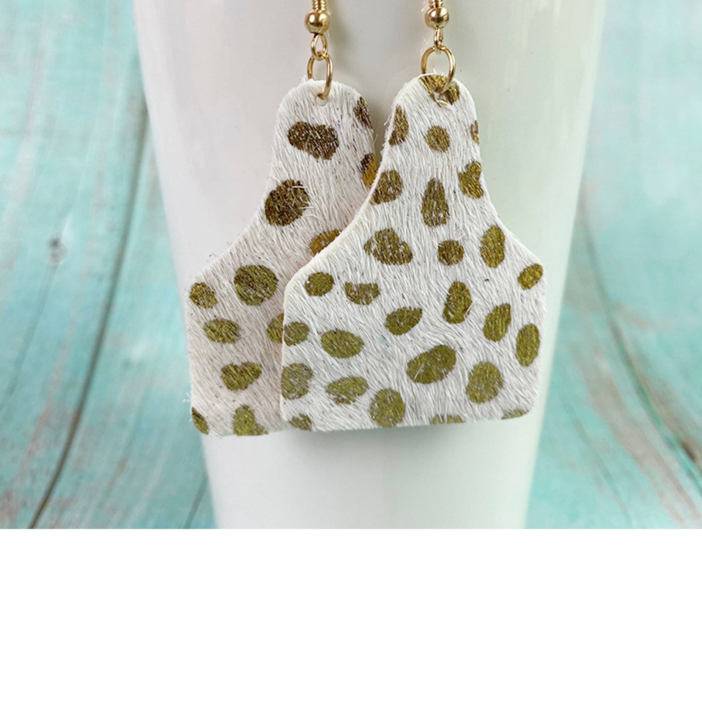 Pendientes de piel de vaca con estampado animal E6545