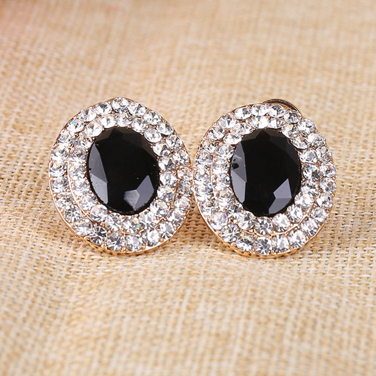 Pendientes de clip con diamantes de imitación ovalados E6646