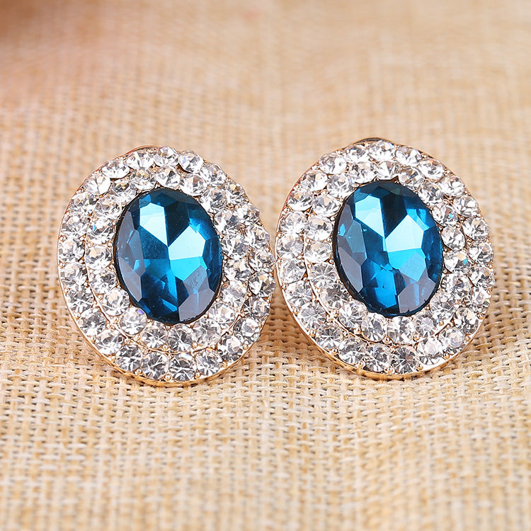 Pendientes de clip con diamantes de imitación ovalados E6646