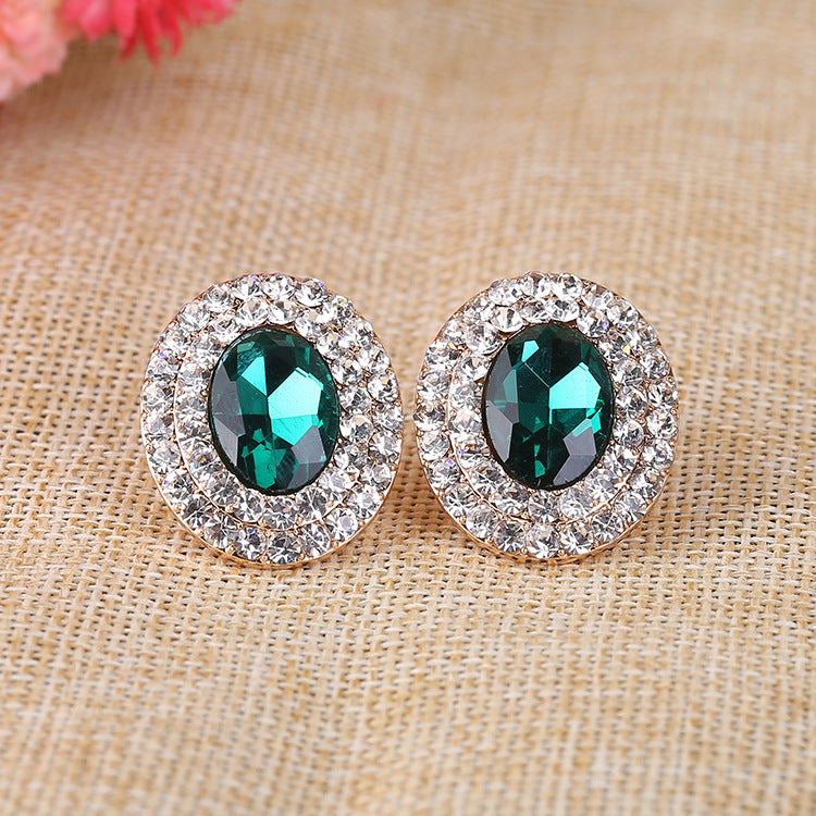 Pendientes de clip con diamantes de imitación ovalados E6646