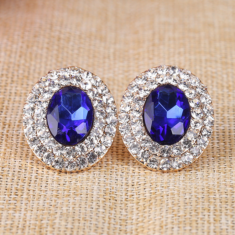 Pendientes de clip con diamantes de imitación ovalados E6646