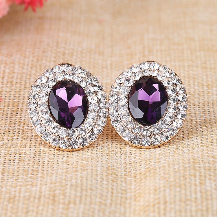 Pendientes de clip con diamantes de imitación ovalados E6646