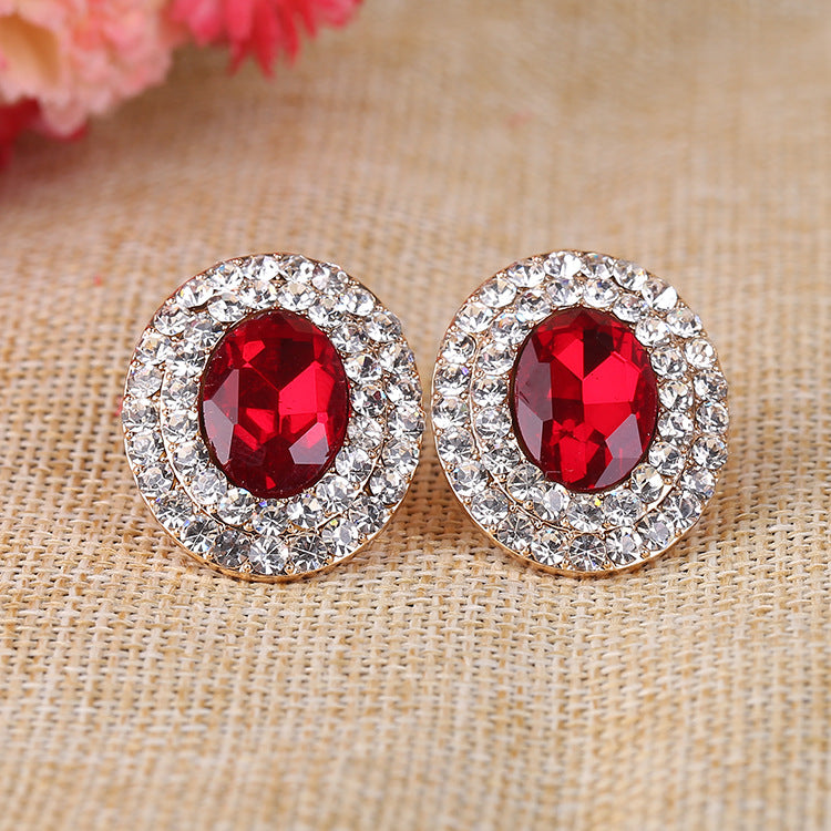 Pendientes de clip con diamantes de imitación ovalados E6646