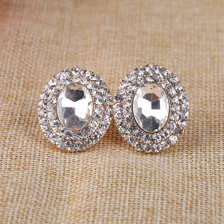 Pendientes de clip con diamantes de imitación ovalados E6646