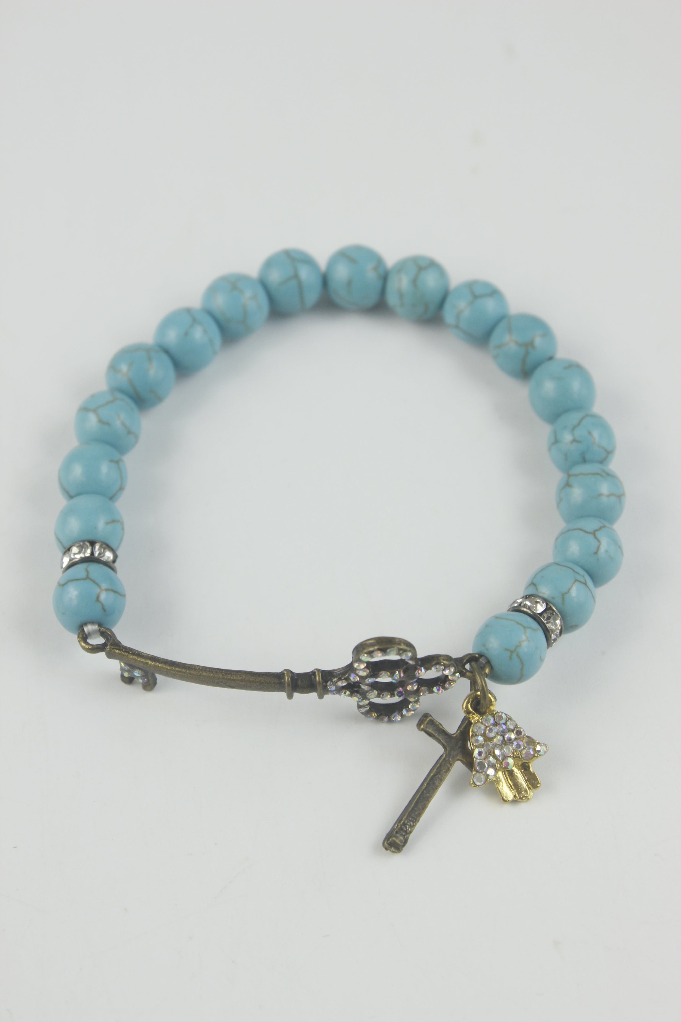 Pulsera con dije de llave turquesa B1378 