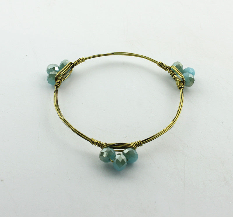 Pulsera de cordón metálico con dijes B1489