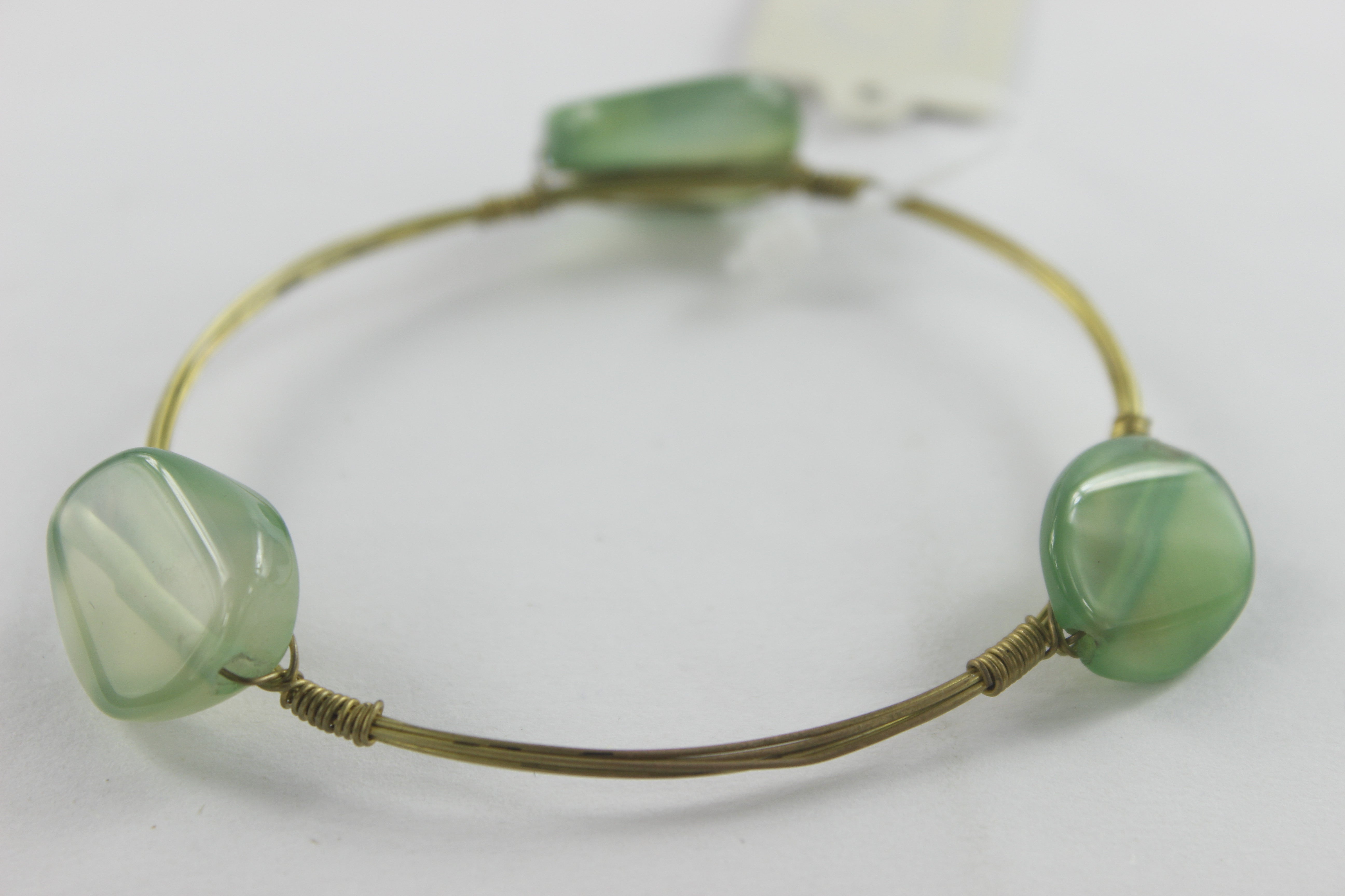 Pulsera de cordón metálico con dijes B1489