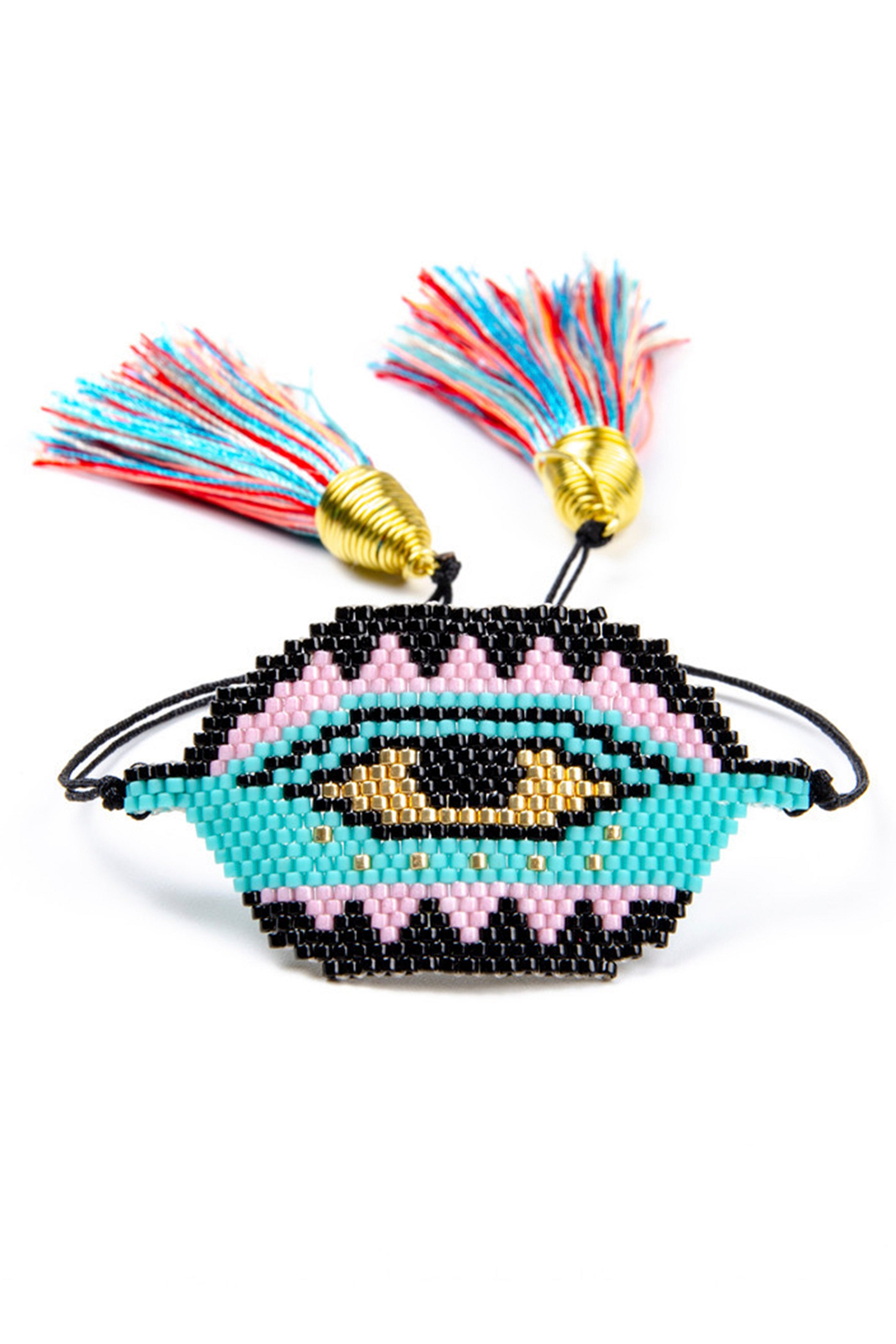 Pulseras trenzadas con cuentas de semillas y ojo malvado B2565