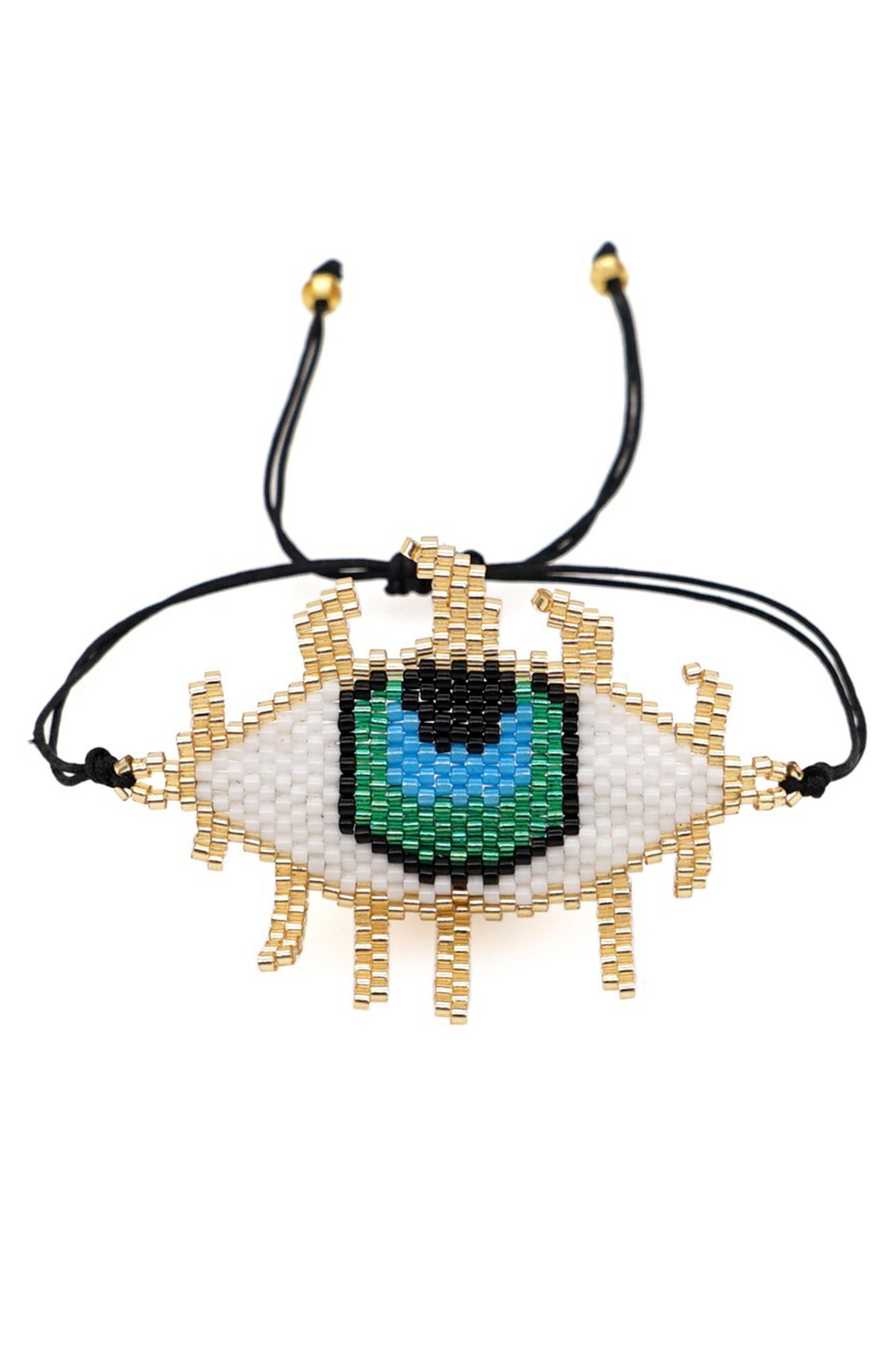 Pulsera trenzada con cuentas de semillas y ojo malvado B2751