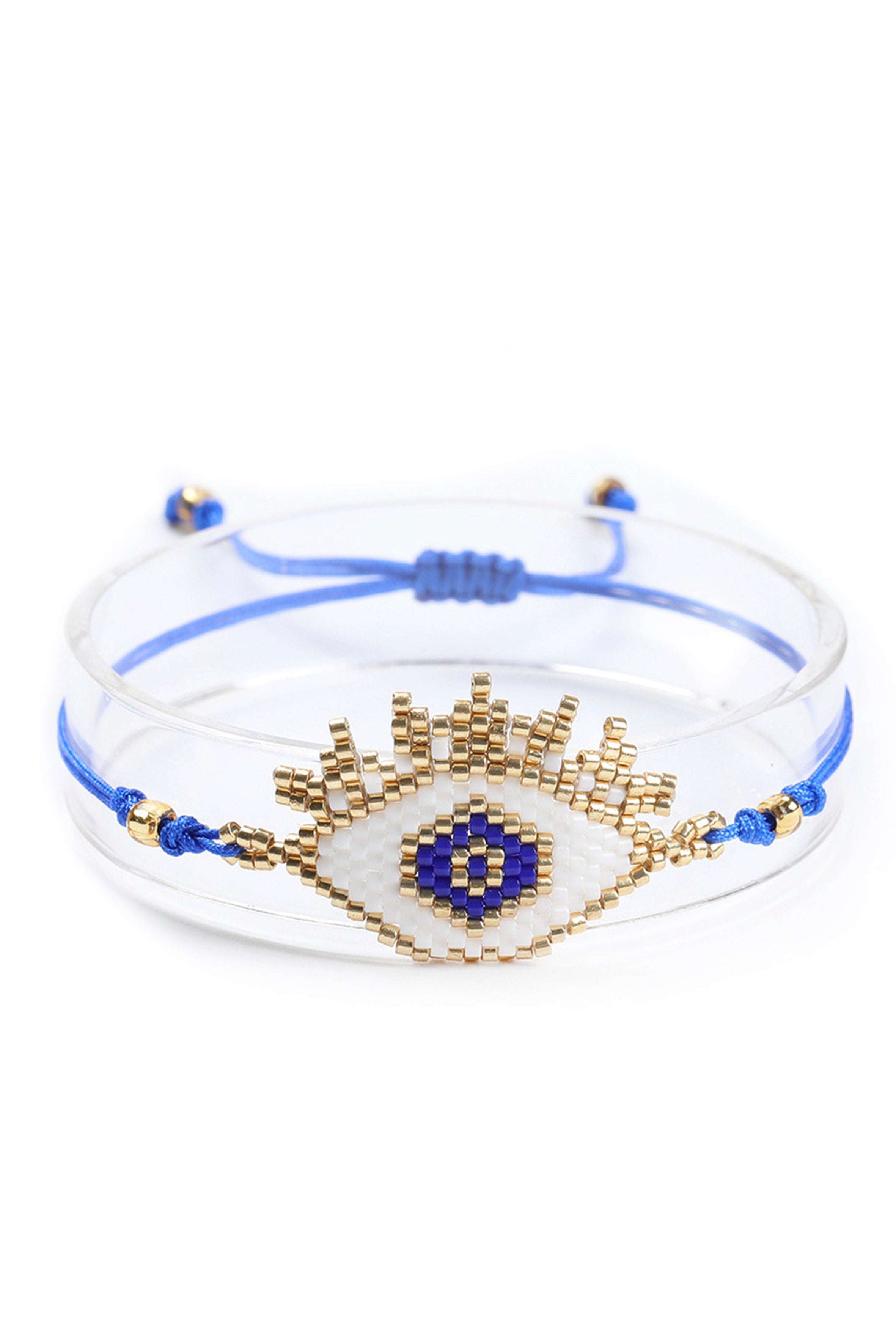 Pulsera trenzada con cuentas de semillas y ojo malvado B2752