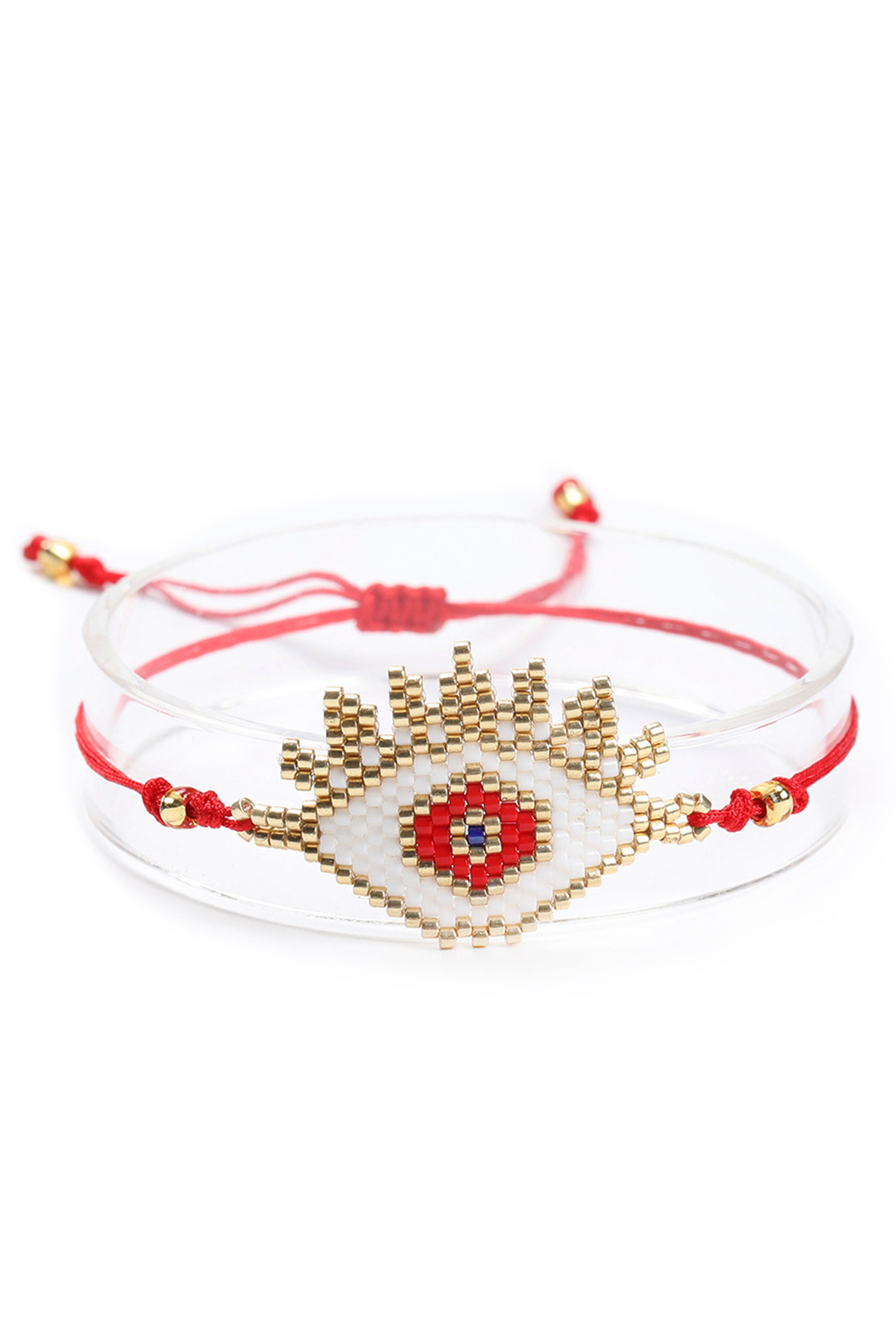 Pulsera trenzada con cuentas de semillas y ojo malvado B2752
