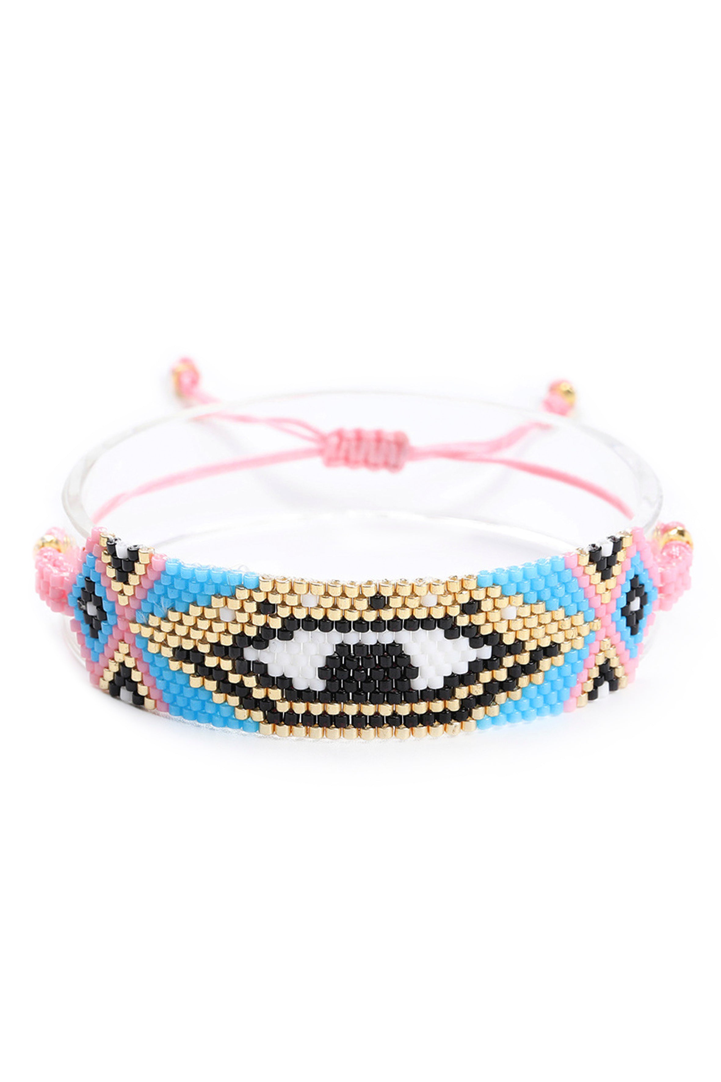 Pulsera trenzada con cuentas de semillas y ojo malvado B3309