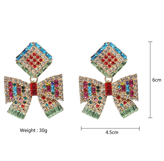 Pendientes de lazo con diamantes de imitación E3449