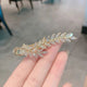 Pinza para el pelo con forma de hoja y diamantes de imitación L3613