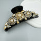 Pinza para el pelo acrílica semicircular con diamantes de imitación florales L4759