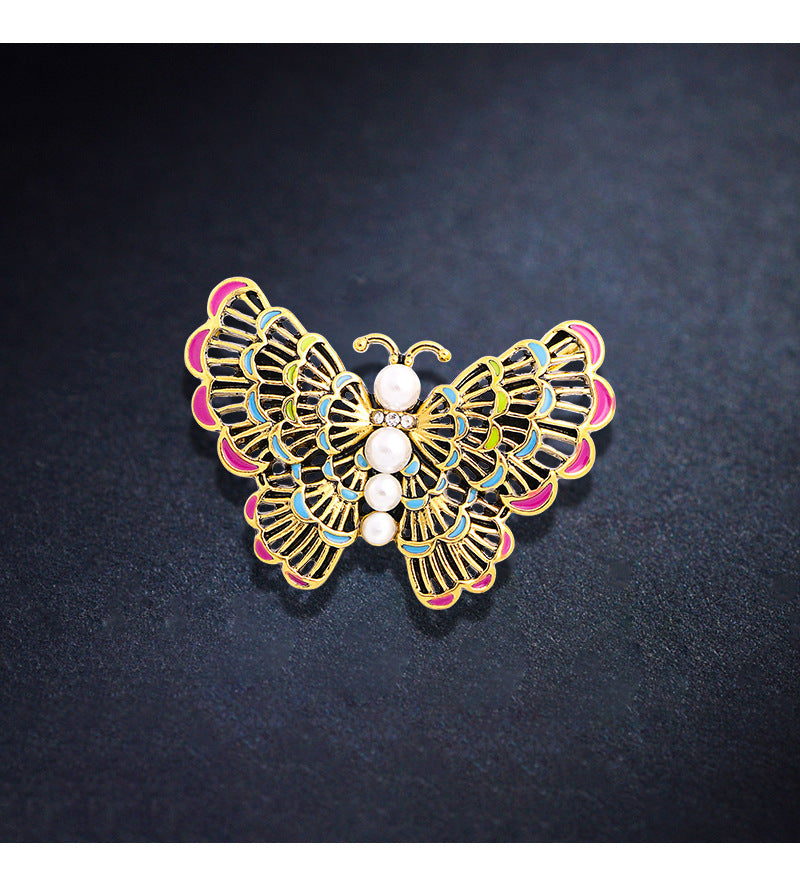 Broche de aleación con diamantes de imitación y forma de mariposa PA3994