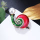 Broche de caracol con diamantes de imitación PA4382
