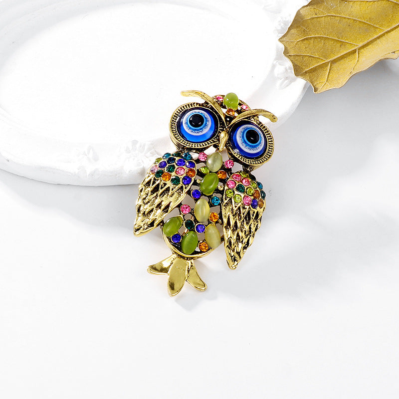 Owl Brooch, offers Signed Oleg Cassini, One Wing Owl Pin